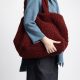Chiara Boncompagno abbigliamento donna autunno inverno 2026 maglia collo alto e jeans caviglia blu
